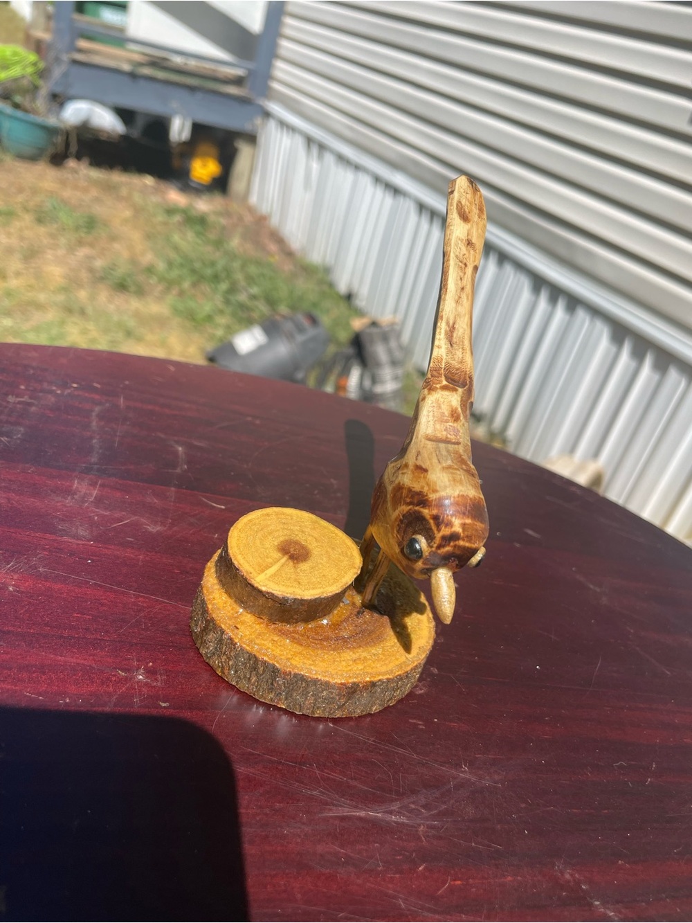 Hand-Carved Wooden Bird Figurine on Natural Wood Base - Brown